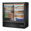 True 46.88" Slim Visual Merchandising Refrigerator displaying various packaged beverages and snacks.
