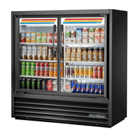 True 46.88" Slim Visual Merchandising Refrigerator displaying various packaged beverages and snacks.