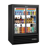 True GDM-33CPT-54-HC-LD pass-thru refrigerated glass door merchandiser showcasing various beverages for retail.
